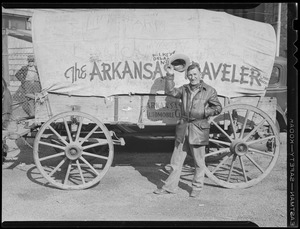 Bill Langford "The Arkansas Traveler" passes through Boston in covered wagon