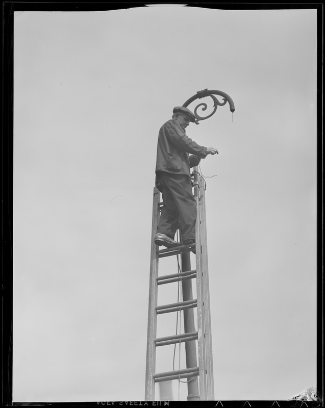 George Allen, climbing and fixing light poles for over 40 years