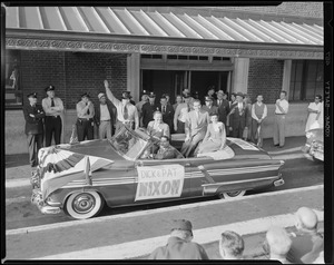Mr. & Mrs. Nixon in open car in Boston