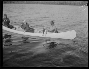 Gov. Curley fishing from canoe in Jamaica Pond