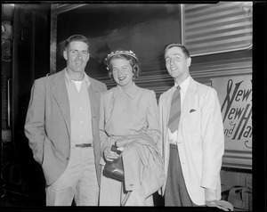 Two men and woman at South Station