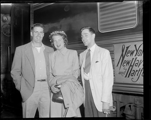 Two men and woman at South Station