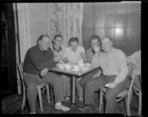 Five men having breakfast