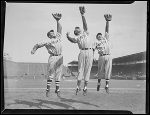 Doerr, Williams and DiMaggio of the Red Sox show their reach, at Fenway Park