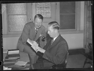 Red Sox G. M. Eddie Collins in office at Fenway Park with Lefty Grove