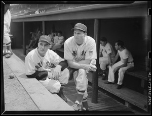 Red Sox players in dugout at Fenway