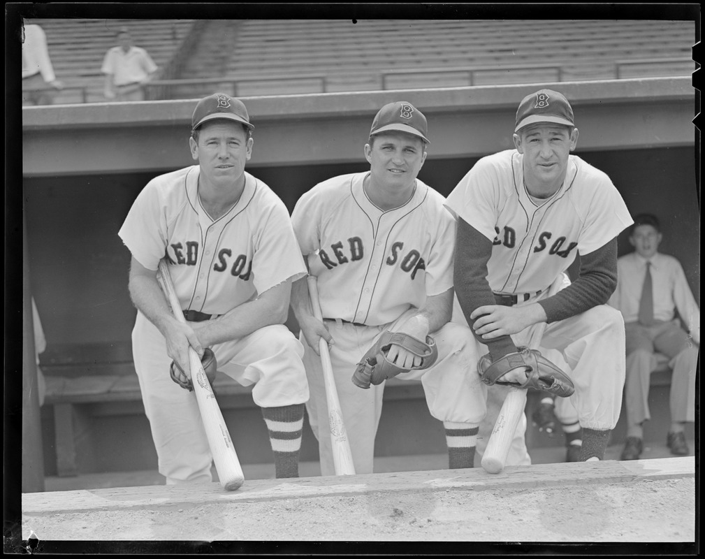 Three Red Sox players in dugout