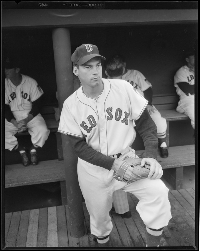 Red Sox player in dugout - Digital Commonwealth