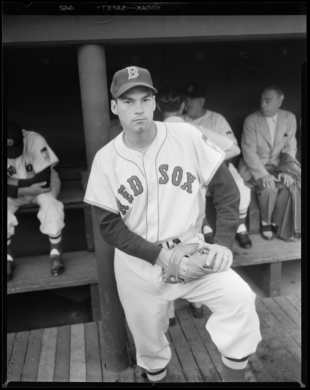 Red Sox player in dugout - Digital Commonwealth