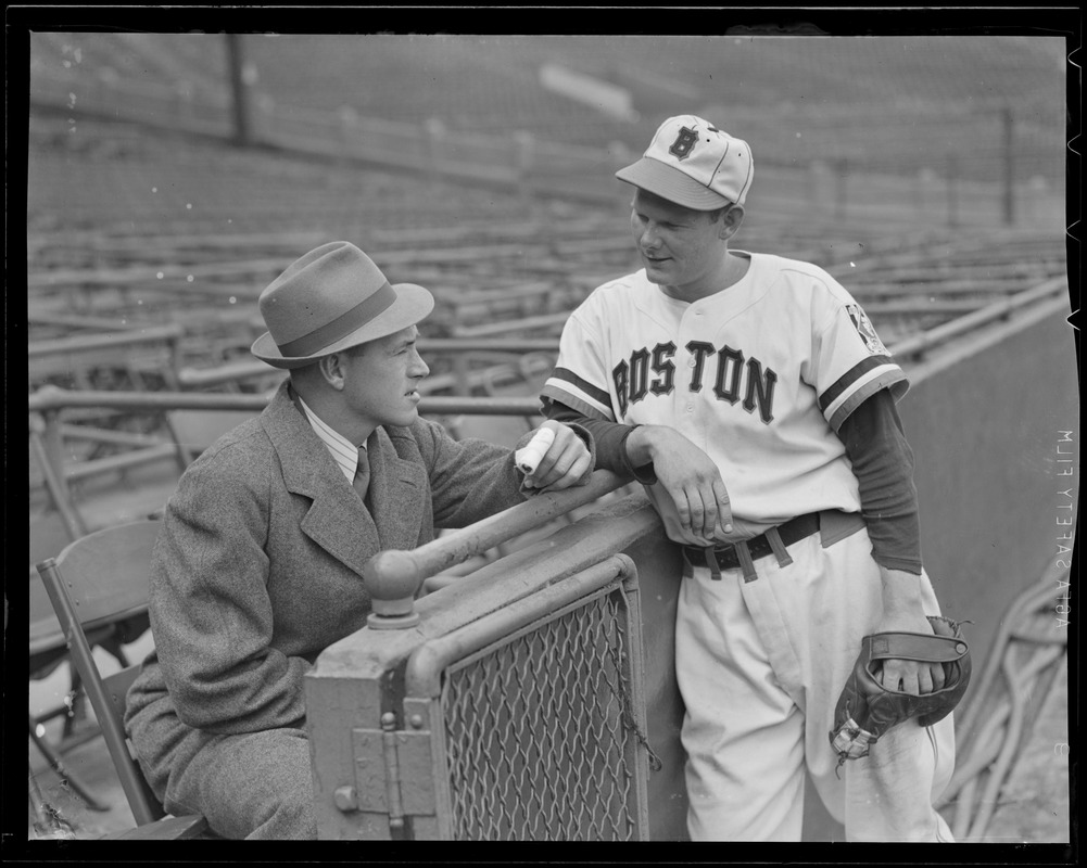 Boston Bees player talks with injured player