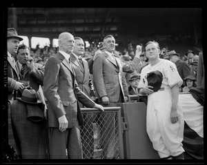 Gov. Saltonstall throws out first ball at Fenway as Connie Mack, Tom Yawkey and Joe Cronin look on