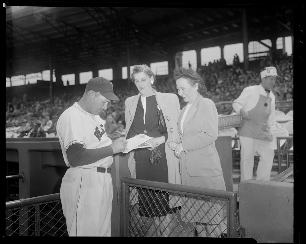 Signing scorecard at Fenway Park