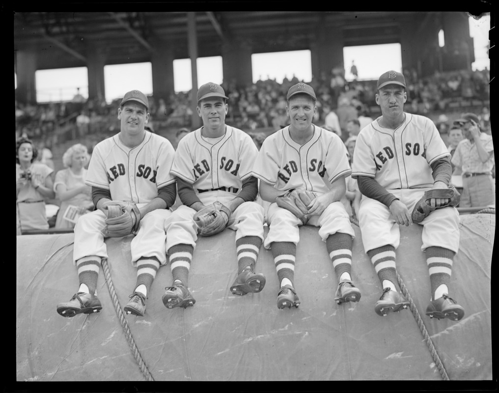 Red Sox players sitting on tarp, 1946 World Series