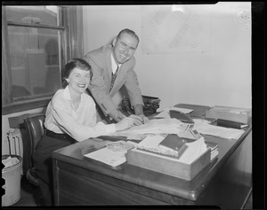 New Braves manager with his secretary in his office at Braves Field