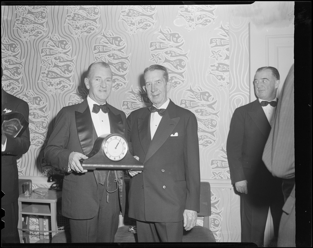 Eddie Collins presented with clock