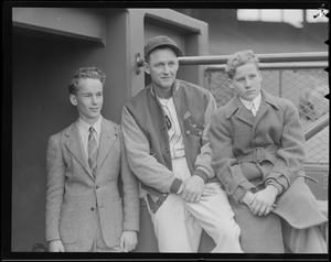 Red Sox player with two boys