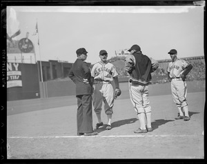 Players, umpire conference at Fenway
