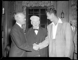 Ted Williams greets two men