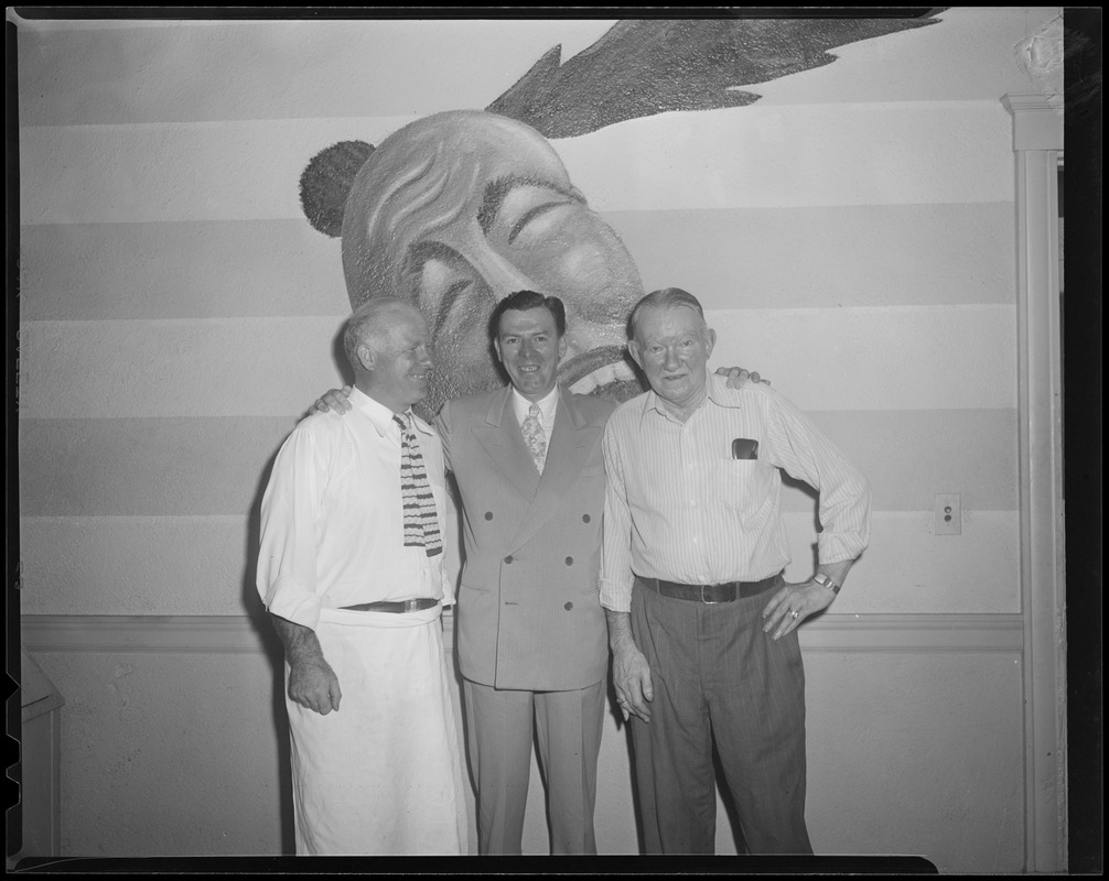 Posing in front of the mascot at Braves Field