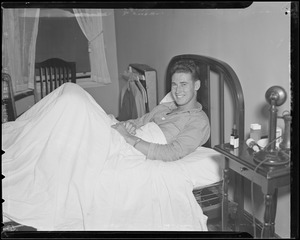 Ted Williams relaxes in his hotel room