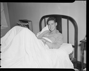 Ted Williams relaxes in his hotel room