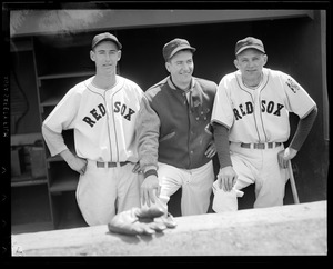 A young Ted Williams in Fenway dugout with teammates