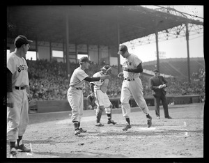 Ted Williams crosses the plate