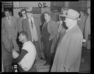 Ted Williams in clubhouse at Fenway with newsmen