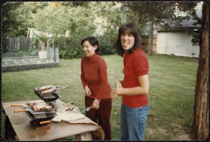 Two women grilling