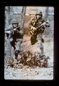 Two soldiers jumping