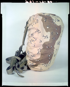 Backpack with desert camouflage cover