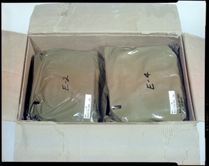 Packaging, 6 pack container of chemical protective suit
