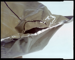 Packaging, barrier bag with material tear