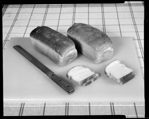 FEL two loafs of bread on cutting board