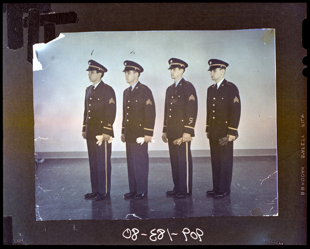Four soldiers in dress uniform