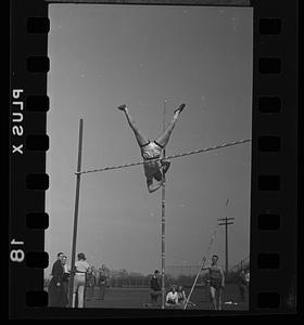Bowdoin's Henry Bunting performing pole vault
