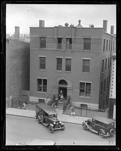 Three people walking out of Station 5