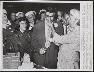 Bridegroom gets the cake
