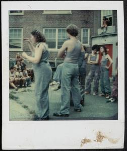 Young adults performing for children at Newtowne Court
