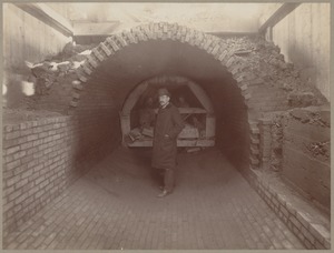 Man standing in unfinished sewer
