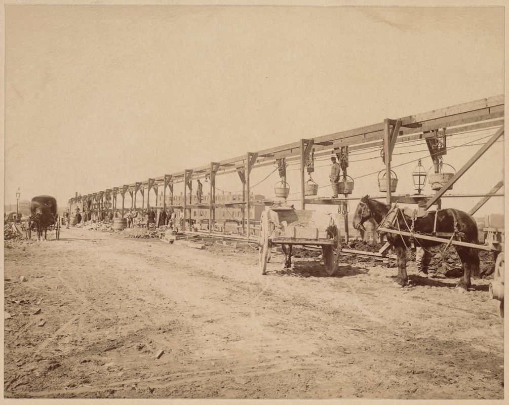 Horse and wagon near construction