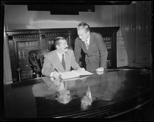 Jerry Colonna seated, with acting Mayor of Boston John E. Kerrigan