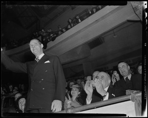 Man waving to crowd