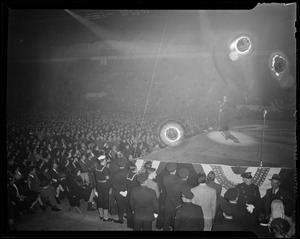 Military members watching Bob Hope on stage