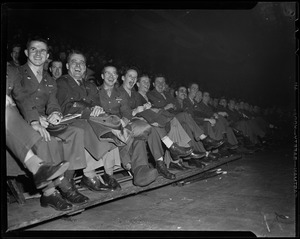 Military members in uniform, laughing