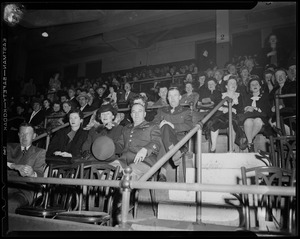 Seated crowd, featuring military members