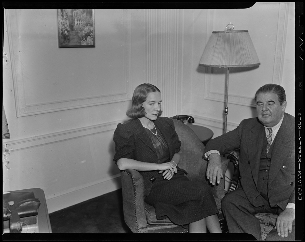 Helen Hayes, in Boston for "Victoria Regina" role at the Shubert Theatre, sits with Gilbert Miller in suite at Ritz Carlton