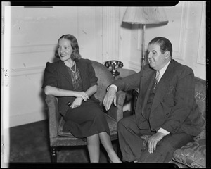 Helen Hayes, in Boston for "Victoria Regina" role at the Shubert Theatre, sits with Gilbert Miller in suite at Ritz Carlton