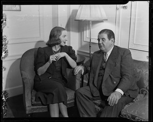 Helen Hayes sitting with Gilbert Miller