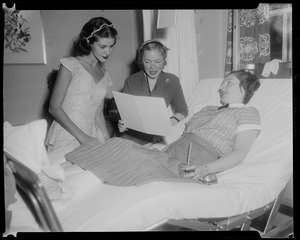 Helen Hayes with two women, one in bed